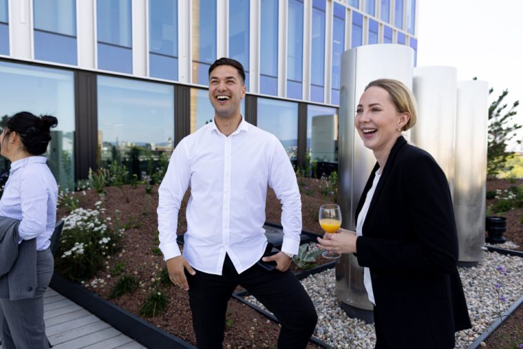 Several employees meeting on the terrace